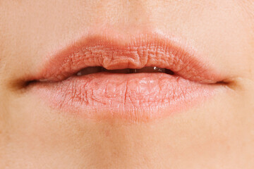 detail of a woman's natural lips without makeup