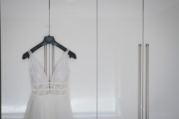Fototapeta na wymiar white clothes hangers