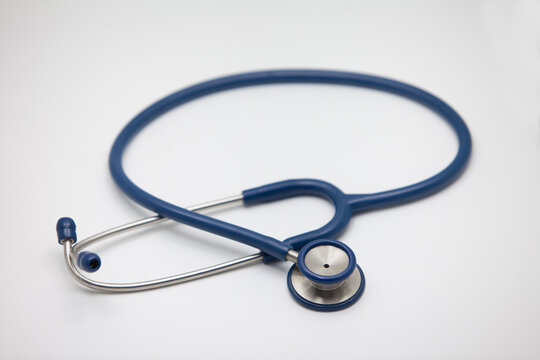 Medical headphones placed on a white background.