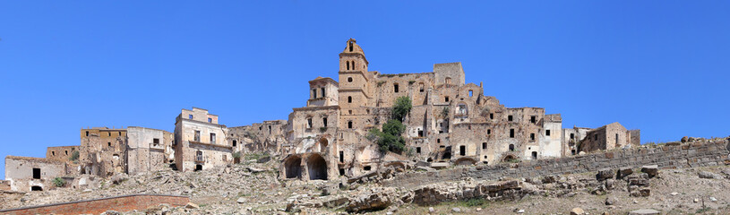 Fototapeta na wymiar Scenic view of Craco ruins, ghost town abandoned after a landslide, Basilicata region, southern Italy