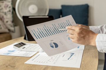 A financial scholar is looking at financial documents to verify the accuracy of company financial...