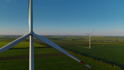 Aerial view of wind turbine park generating environmental friendly energy.