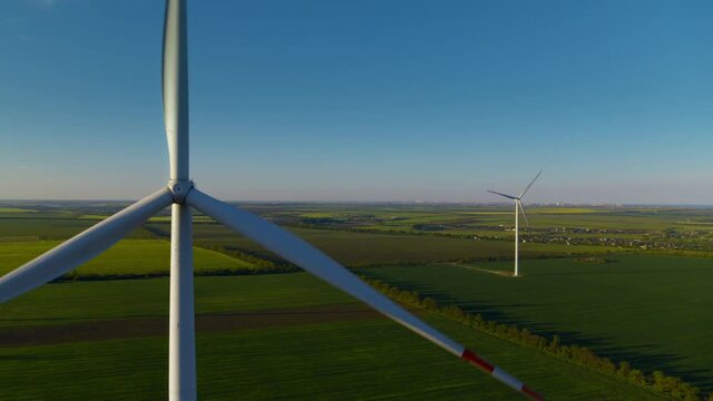 Aerial view of wind turbine park generating environmental friendly energy.