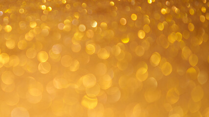 Bokeh light gold background.