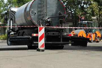 Road repair machinery working on city street