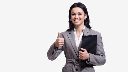 Smiling businesswoman with clipboard showing like gesture isolated on white.