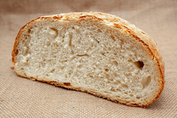 Photo of baked bread. A loaf of bread. Private bakery.