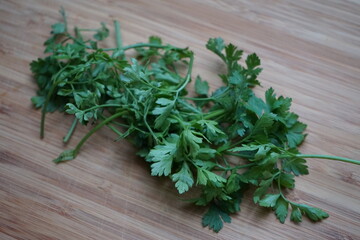 smooth parsley on wooden board