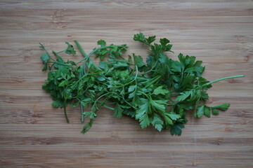 smooth parsley on wooden board