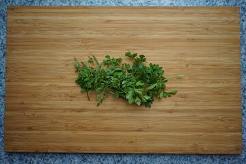 smooth parsley on wooden board