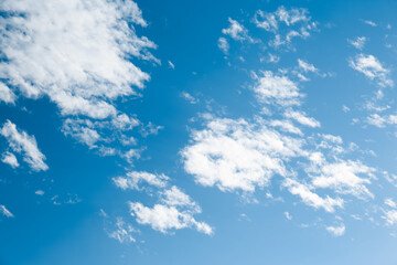 Fototapeta na wymiar Beautiful light blue sky with fluffy clouds