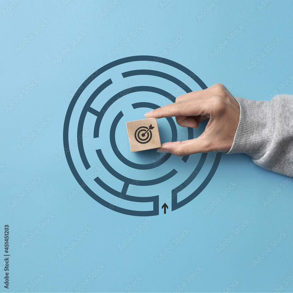 Poster drawing of the maze and the target icon. a symbol of the difficult path to the goal