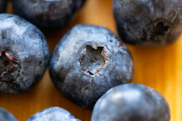 Fresh healthy ripe blueberries on a kitchen table