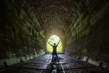 Tunnel with green forest landscape near the village of Slavosovce, Slovakia