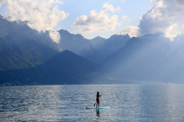 Fototapeta na wymiar paddle surf in lac leman switzerland