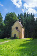 Fototapeta na wymiar Chapel in a forest clearing