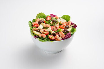 Fresh shrimp salad with cherry tomatoes and white cheese,in white bowl, isolated