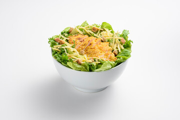 Fresh lettuce salad with chicken breast and grated parmesan cheese, isolated