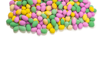 Group of colorful peanuts in glaze.