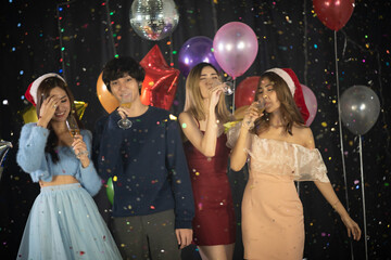 portrait of young people having happiness fun with friendship in new year tradition, smiling with alcohol in birthday party to joy with event in nightclub