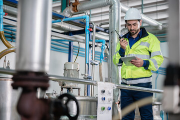 professional inspection control scientist in uniform are working for fruit juice production...