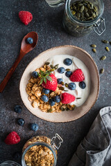 Obraz na płótnie Canvas Healthy breakfast, cereal with berries and yogurt