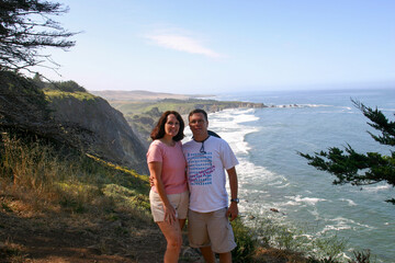 A Loving Couple Standing over a California Beach Cliff