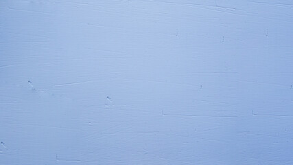Abstract light blue background and old plaster on the wall.