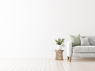 Simple minimalist Christmas interior mockup with grey sofa and fir tree branch in vase with decoration on wicker rattan table on empty white wall background. 3d rendering, illustration.