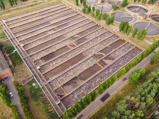 Wastewater treatment plant with round clarifiers for recycle dirty sewage water, aerial view