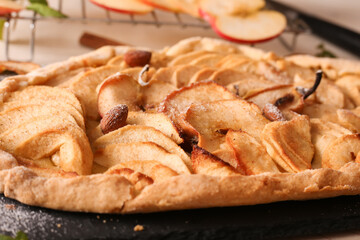 Appetizing pie close-up on a wooden background