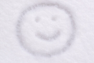 snow texture close-up smile face is drawn