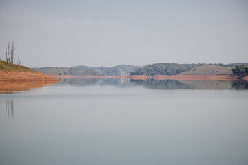 View of the dam in low water level water crisis.
