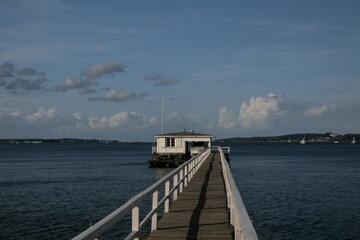Naklejka premium Beautiful view to a picturesque pier at the Kiel Fjord.