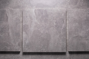Abstract grey background texture at table or wall. Picture frame at gray wall background