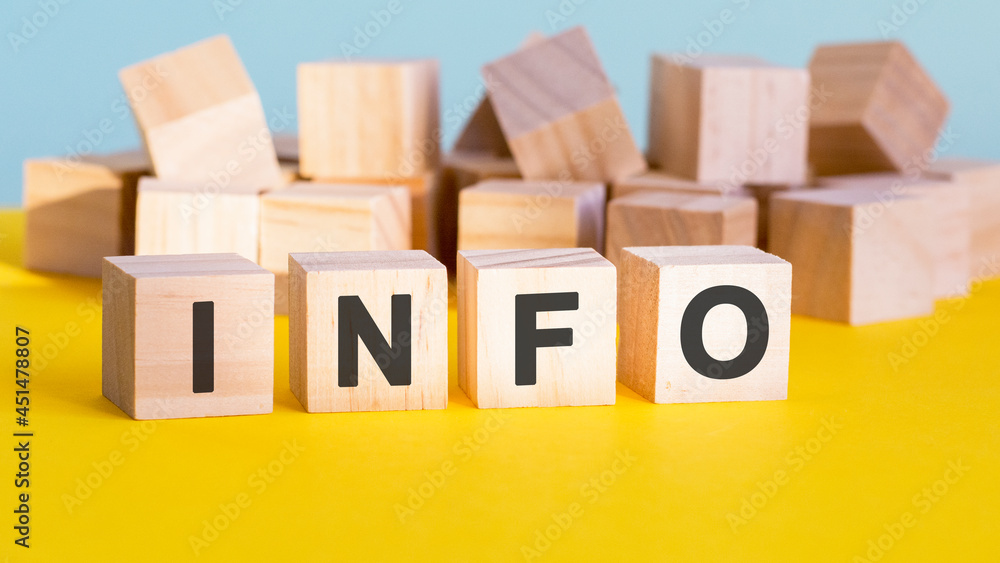Poster info word construction with letter blocks and a shallow depth of field