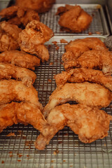 Southern fried chicken on a metal cooling rack