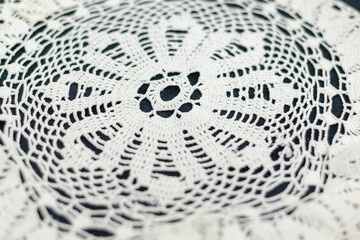 Wicker (knitted) white napkin on the table.
