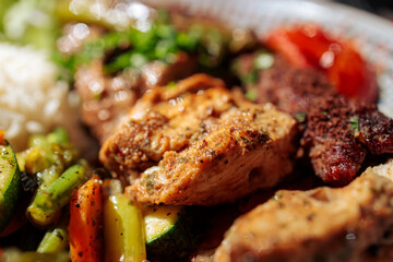 Closeup of Plated Middle Eastern Meal with Grilled Meat and Vegetables