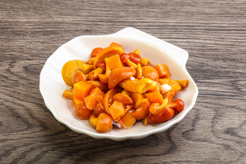 Marinated pickled honey mushrooms in the bowl