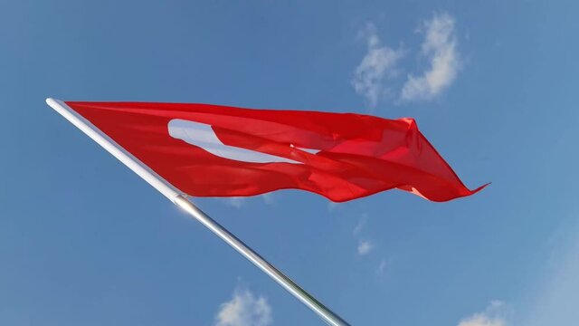 Turkey. National country flag on blue sky background. Flying fabric symbol. Tourism or travel summer day. international patriotic emblem. Nobody. Horizontal video