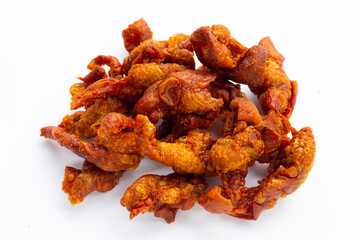 Chispy fried chicken skin on white