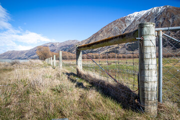 Electric farm fence in the high country, Canterbury, New Zealand
