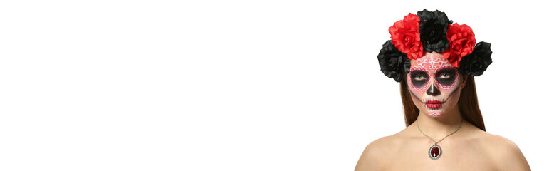 Young woman with painted skull on her face for Mexico's Day of the Dead (El Dia de Muertos) against white background