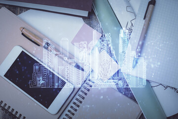 Multi exposure of smart city technology drawing over table with phone. Top view.