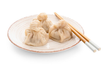 Plate with tasty dumplings and chopsticks on white background