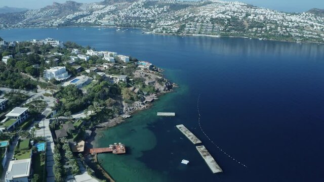 Amazing panoramic aerial 4k view from drone of beautiful bay of G�ndo_an and Yal�kavak in Bodrum on a bright and sunny day in Mugla province in Turkey