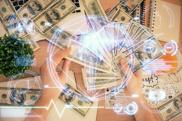 Multi exposure of education theme drawing hologram and USA dollars bills and man hands.