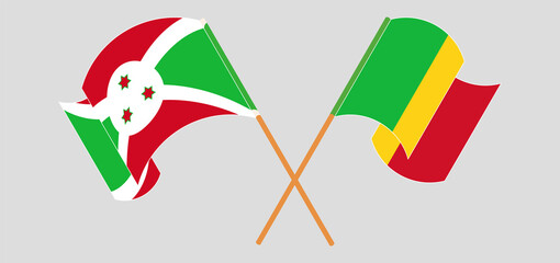 Crossed and waving flags of Burundi and Mali