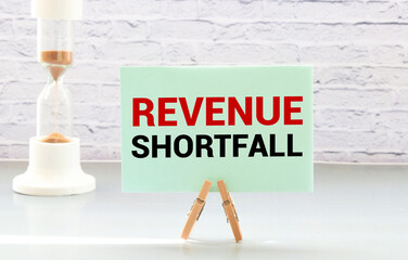 The text Revenue is flushed down the drain.